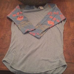 LuLaRoe top. Aztec printed sleeves. Size small